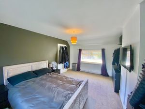 Bedroom One- click for photo gallery